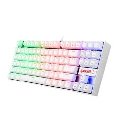 Redragon K552W-RGB Mechanical Gaming Keyboard is built for gamers and fast typists who want a compact 87-key layout without sacrificing durability or responsiveness. With its clicky Cherry MX Blue-equivalent mechanical switches, tactile feedback, and sturdy metal-ABS construction, it ensures long-lasting performance for gaming, office use, and daily tasks. The white body and RGB backlighting deliver a clean, modern aesthetic that fits perfectly with minimalist gaming setups in Bahrain. Its plug-and-play USB wired connection guarantees stable input with zero lag — ideal for competitive gameplay. Whether you're pushing during intense FPS battles, typing long assignments, or editing content, the K552W-RGB delivers accurate keypresses and an impressive typing feel. This keyboard is compact, reliable, and crafted for gamers who want performance without a premium price tag. Key Features Cherry MX Blue-Equivalent Mechanical Switches The Redragon K552W-RGB uses custom Blue switches designed to mimic the experience of Cherry MX Blue — crisp, tactile, and clicky. These switches offer excellent feedback for typing and gaming, giving users a satisfying “click” with every keypress. They are ideal for users who want precision, accuracy, and audible confirmation during gameplay or typing sessions. Their durability rating ensures long-lasting responsiveness even under heavy usage. Whether you're coding, gaming, or writing for long hours, these switches maintain consistent actuation without mushiness. This makes the keyboard perfect for gamers and professionals who value reliable mechanical performance. Dynamic RGB Backlighting The keyboard includes multiple RGB lighting presets, customizable brightness levels, and breathing effects. This allows users to personalize the keyboard's lighting according to their gaming setup or mood. The white body enhances RGB glow, creating a clean, vibrant look on any desk. Beyond aesthetics, the lighting helps during late-night gaming sessions by keeping keys visible without straining your eyes. You can cycle between effects, adjust lighting modes, and create a unique visual style that makes your gaming station stand out — especially in darker rooms or RGB-themed setups. Durable Metal-ABS Build Built with a metal top plate and reinforced ABS body, the K552W-RGB provides long-term stability and toughness. Its construction ensures that the frame doesn’t flex during intense gaming sessions, maintaining a premium feel despite being budget-friendly. This durability makes it ideal for gaming setups where keyboards take heavy daily use. The rugged build also helps protect the switches and internal components from accidental knocks or desk pressure. Even with continuous keystrokes, travel, or workspace movement, the keyboard retains its solid feel. It is designed for users who want reliability without worrying about fragile components. 87-Key Compact Tenkeyless Layout The compact TKL (Tenkeyless) design eliminates the number pad, creating more desk space for mouse movement — perfect for FPS players, small desks, and minimalist setups. This layout improves ergonomics and allows gamers to maintain better posture while playing. Despite being compact, it maintains all essential keys needed for gaming, productivity, and multitasking. Students, office workers, and gamers can enjoy an efficient layout that balances space-saving convenience with full performance capabilities. Specifications General Model: Redragon K552W-RGB Keyboard Type: Mechanical Layout: 87-Key TKL Color: White Switches / Performance Switch Type: Blue Mechanical (Cherry MX Blue Equivalent) Key Rollover: 87-Key Anti-Ghosting Durability: 50+ Million Keystrokes Connectivity Connection: USB Wired Cable Type: Non-detachable Lighting Backlight: RGB Lighting Modes: Multiple presets Physical Body Material: Metal + ABS Dimensions: Compact TKL Weight: 0.9kg approx. Compatibility OS Support: Windows 7/8/10/11 Partial Support: macOS (no software) Who Is This Keyboard Best For? ✔ Gamers who want clicky mechanical switches ✔ Students & typists who love tactile feedback ✔ RGB setup lovers with white aesthetic themes ✔ Users who want a durable yet budget-friendly mechanical keyboard ✔ Bahrain users wanting reliable performance and long lifespan Why Buy from Games Gravity? At Games Gravity, we focus on authenticity, reliability, and customer trust. Every product sold is 100% original, sealed, and sourced from trusted distributors. We don’t deal in used or refurbished products your gaming gear is always brand new and performance-ready. ✔ Original products guaranteed ✔ Carefully packed for safe delivery ✔ Trusted customer support ✔ Honest recommendations no upselling ✔ Best value options for gamers in Bahrain Your gaming setup deserves real, high-quality gear and we deliver exactly that.